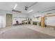 Spacious garage with ample storage space, a utility sink, and work area at 3107 Robyn Ct., Little River, SC 29566