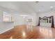 Open living and dining area featuring hardwood floors and lots of natural light at 3107 Robyn Ct., Little River, SC 29566