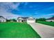 Charming one-story home features a two-car garage, landscaped front yard, and inviting entryway at 3148 Gause Rd., Loris, SC 29569