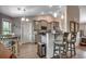 Well-equipped kitchen with granite countertops, modern appliances, and a breakfast bar at 3148 Gause Rd., Loris, SC 29569