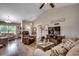Spacious living area showcases an open layout with lots of natural light and luxury vinyl plank flooring at 3148 Gause Rd., Loris, SC 29569