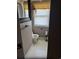 Small bathroom showcasing toilet, window, and tile floors at 3293 Schoolhouse Dr., Hemingway, SC 29554