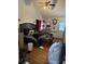 Spacious bedroom with hardwood floors, ceiling fan, and natural light at 3293 Schoolhouse Dr., Hemingway, SC 29554