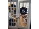 Office seen through glass paneled french doors, offering privacy and natural light at 3293 Schoolhouse Dr., Hemingway, SC 29554