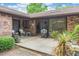 Backyard featuring a deck, chairs, and a grill at 33 Brassie Dr., Carolina Shores, NC 28467