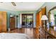 Well-lit bedroom with a sliding glass door, offering access to the patio and backyard at 33 Brassie Dr., Carolina Shores, NC 28467