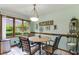 Eat-in breakfast nook area with a light fixture and views of the outdoors at 33 Brassie Dr., Carolina Shores, NC 28467