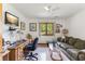 Home office featuring a desk, sofa, and a ceiling fan at 33 Brassie Dr., Carolina Shores, NC 28467