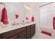 Bright bathroom showcasing double sinks, vanity, and a shower, designed for convenience and style at 3381 Pampas Dr., Myrtle Beach, SC 29577