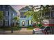 Eye-catching two-story home with a screened porch, complemented by a charming lawn and mature trees at 3381 Pampas Dr., Myrtle Beach, SC 29577