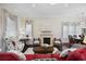 Bright living room with hardwood floors, stylish furnishings, and a decorative fireplace at 3381 Pampas Dr., Myrtle Beach, SC 29577