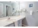 Cozy bathroom with a large mirror, updated fixtures, and a decorative shelf at 342 Pinehurst Ln. # 12J, Pawleys Island, SC 29585
