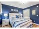 Charming bedroom featuring a comfortable bed, coastal accents, and ample closet space at 342 Pinehurst Ln. # 12J, Pawleys Island, SC 29585