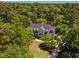 Aerial view of home showcasing wooded lot at 352 Old Carriage Loop, Georgetown, SC 29440
