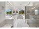 Luxurious bathroom with dual sinks, soaking tub, and glass-enclosed shower at 352 Old Carriage Loop, Georgetown, SC 29440