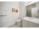 Clean bathroom featuring tiled floors, a single sink vanity, and a shower with glass door at 352 Old Carriage Loop, Georgetown, SC 29440