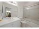 Bright bathroom featuring a shower-tub combo and a modern single sink vanity at 352 Old Carriage Loop, Georgetown, SC 29440