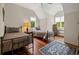 Charming bedroom with hardwood floors, twin beds, vaulted ceilings and bright natural light at 352 Old Carriage Loop, Georgetown, SC 29440