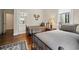 Cozy bedroom featuring hardwood floors and twin beds with an ensuite bathroom at 352 Old Carriage Loop, Georgetown, SC 29440