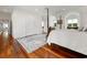 Bright main bedroom with hardwood floors and large closets provides ample storage space at 352 Old Carriage Loop, Georgetown, SC 29440