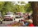 Community parade with decorated vehicles and patriotic decorations, showing community spirit at 352 Old Carriage Loop, Georgetown, SC 29440