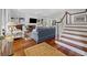 Bright living room with hardwood floors and a fireplace at 352 Old Carriage Loop, Georgetown, SC 29440