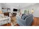 Cozy living room featuring built-in bookshelves and a fireplace at 352 Old Carriage Loop, Georgetown, SC 29440