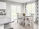 Bright dining room with a sliding glass door and lots of windows, and room to gather at 355 Myrtle Meadows Dr # B, Conway, SC 29526