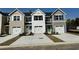 New townhomes feature Hardie siding, paired garages, private drives, and professionally landscaped yards at 355 Myrtle Meadows Dr # B, Conway, SC 29526
