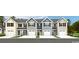 Charming new townhomes with Hardie siding, paired garages, and professionally landscaped yards at 355 Myrtle Meadows Dr # B, Conway, SC 29526