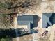 Aerial view of two newly constructed houses on a sandy lot at 357 Log Cabin Rd., Loris, SC 29569