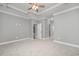 This bedroom features carpet flooring and a trey ceiling at 357 Log Cabin Rd., Loris, SC 29569