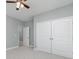 Bedroom with light walls, ceiling fan and double door closet at 357 Log Cabin Rd., Loris, SC 29569