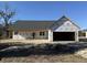 New construction home featuring durable home guard wrap during building process at 357 Log Cabin Rd., Loris, SC 29569