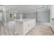 Spacious kitchen island with white cabinets, granite countertops, and modern pendant lighting at 357 Log Cabin Rd., Loris, SC 29569
