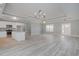 Open floor plan featuring modern lighting and view into the kitchen at 357 Log Cabin Rd., Loris, SC 29569