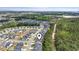 An aerial view showcases the neighborhood's layout and proximity to lush green spaces and more houses at 3725 Park Pointe Ave., Little River, SC 29566