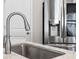 Close-up of a kitchen sink and stainless steel refrigerator at 3725 Park Pointe Ave., Little River, SC 29566