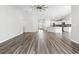 Spacious living room with hardwood floors connecting to the modern kitchen at 3725 Park Pointe Ave., Little River, SC 29566