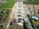 A street view shows new construction homes, interspersed with green trees at 375 Log Cabin Rd., Loris, SC 29569