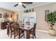 Casual dining area featuring a wooden table, chairs, a ceiling fan and tile flooring at 3757 Kingsley Dr., Myrtle Beach, SC 29588