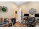 Cozy office space with wood floors and a view into the laundry area at 3757 Kingsley Dr., Myrtle Beach, SC 29588