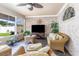 Comfortable sunroom featuring brick walls and wicker furniture at 3757 Kingsley Dr., Myrtle Beach, SC 29588
