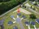 Aerial view of a single-Gathering home nestled in a cul-de-sac surrounded by ponds at 40 Little Peru Ct., Georgetown, SC 29440