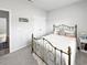 Cozy bedroom with carpet, stylish bed, and view to closet and connecting room at 40 Little Peru Ct., Georgetown, SC 29440