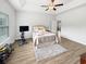 Bright Primary bedroom features high tray ceiling and exercise equipment at 40 Little Peru Ct., Georgetown, SC 29440
