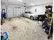 Spacious two-car garage with ample storage space and a modern car at 40 Little Peru Ct., Georgetown, SC 29440