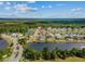 Aerial view of a residential neighborhood with lakes, lush greenery, and well-maintained homes at 400 Palo Verde Dr., Myrtle Beach, SC 29579