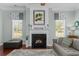 Charming living room features a fireplace and warm lighting at 400 Palo Verde Dr., Myrtle Beach, SC 29579