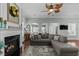 Inviting living room showcasing a fireplace, seating, and modern lighting at 400 Palo Verde Dr., Myrtle Beach, SC 29579
